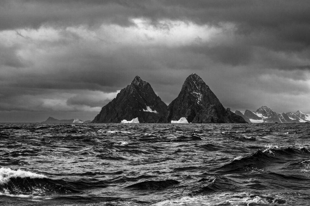 Rocks and icebergs in the Southern Ocean, print on Fine Art Paper or Alu Dibond